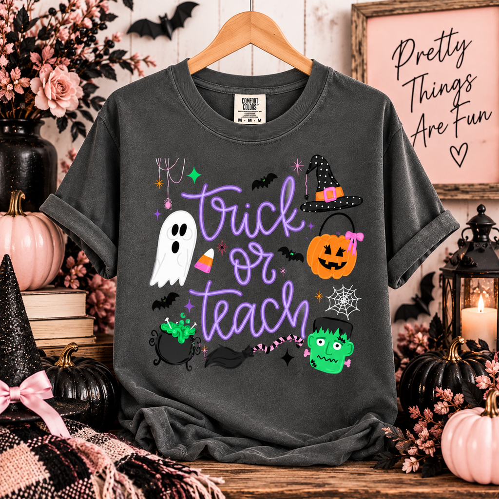 Trick or Teach teacher graphic tee on a Comfort Colors tee